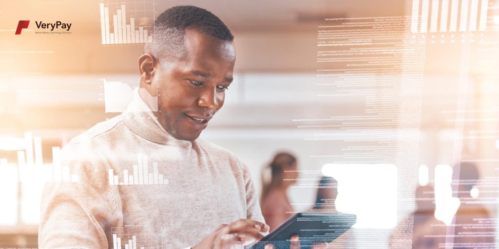 Man looking at a tablet interacting with VeryPay.