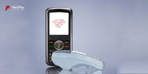 A non-internet enebaled phone standing next to a landline with the no connectivity sign displayed.